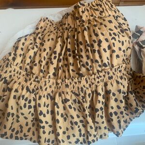 Leopard print ruffled mini skirt. Never worn. New with tags.